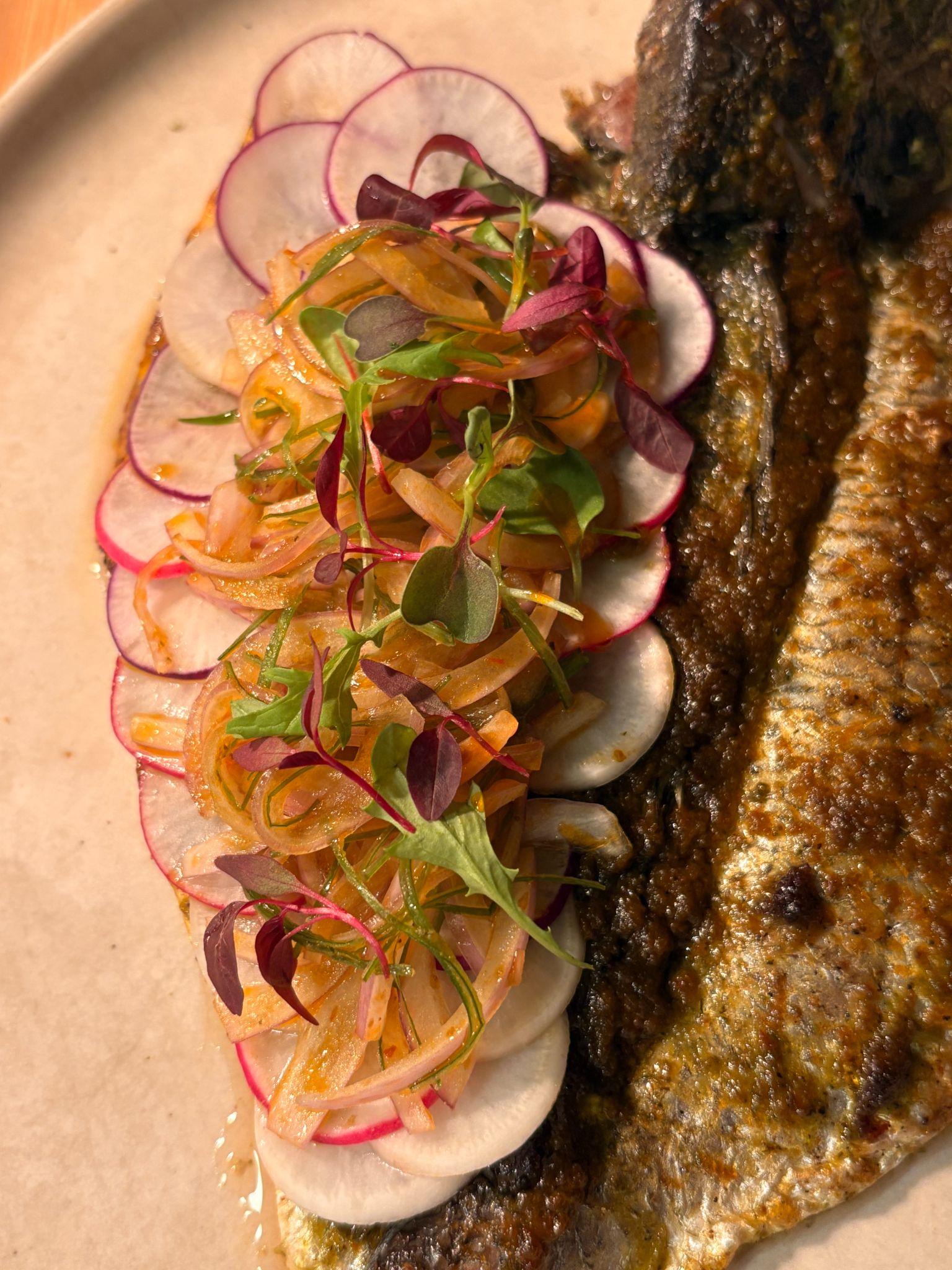 Grilled fish with pickled radish